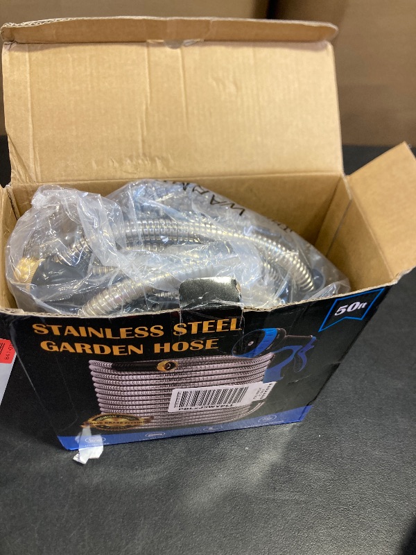 Photo 1 of Garden Hose 50FT, Water Hose with 10 Function Nozzle, Garden Hose Metal with Leak-proof Connectors, Kink-Free & Ultra Flexible, Rust/Pet/Puncture Proof for Lawn, Yard, RV, Car Wash, 550PSI