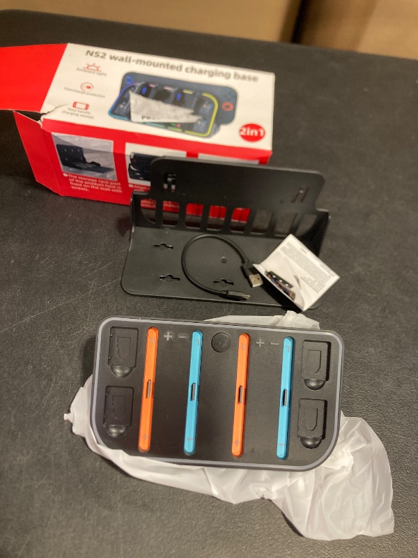 Photo 1 of Wall Mount for Nintendo Switch 2 2025 - Switch Wall Mount with RGB Light & Joy Con Charger - 4 Joy Con Charging Ports, 7 RGB Modes Light, 4 Game Card Storage - Magnetic Charging with LED Indicators