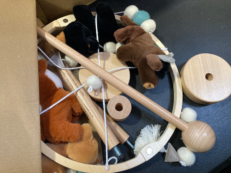 Photo 1 of The Peanutshell Crib Mobile for Boys or Girls - Wooden Musical Baby Crib Mobile with 12 Lullabies, Western Woods Baby Western Woods Nursery Décor