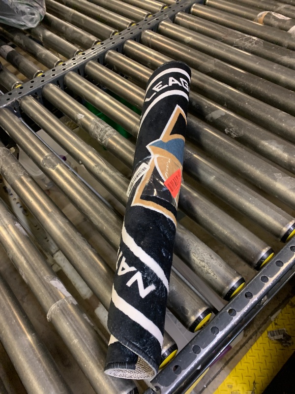 Photo 1 of FANMATS 22915 Vegas Golden Knights Hockey Puck Shaped Rug - 27in. Diameter, Hockey Puck Design, Sports Fan Accent Rug