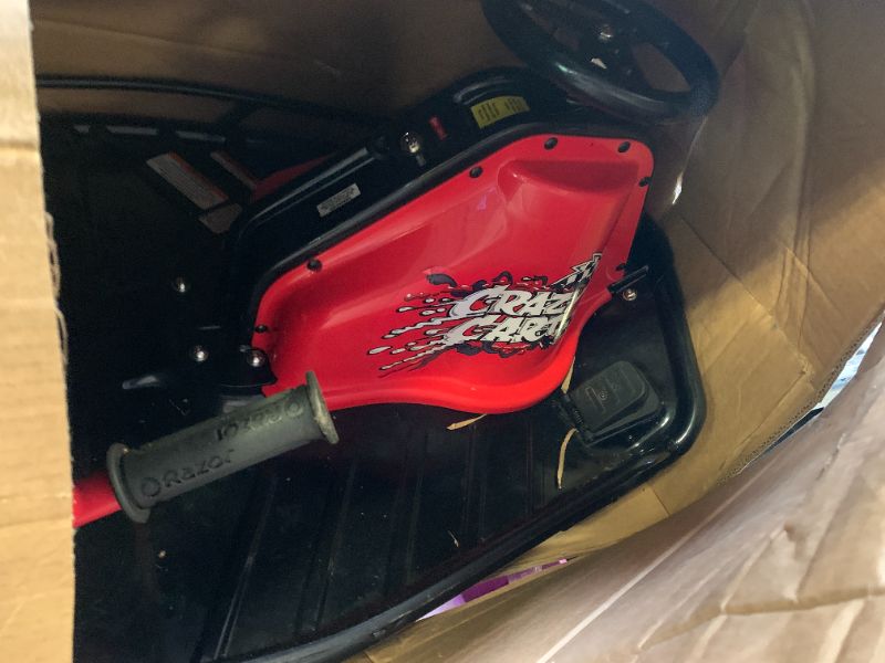 Photo 1 of Razor Crazy Cart Sport - 24V Electric Drifting Go Kart, Variable Speed, Up to 12 mph, Up To 40 Minutes of Continuous Use, Drift Bar for Controlled Drifts, Ages 9+