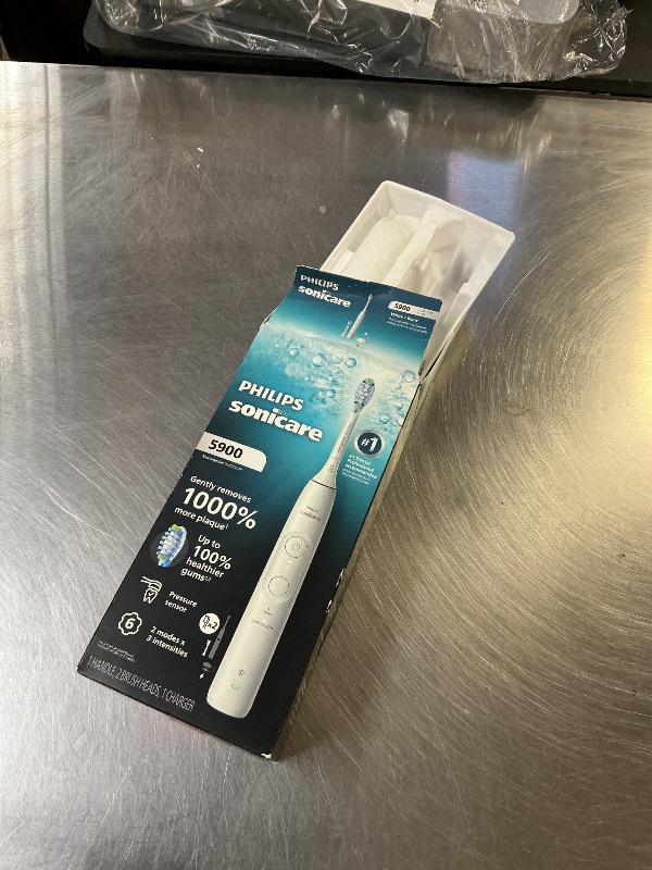Photo 1 of Philips Sonicare 5900 Series Electric Toothbrush - Next-Generation Sonicare Technology, Pressure Sensor, 6 Brushing Settings, SmarTimer, BrushPacer, 21-Day Runtime, White, Model HX7130/02