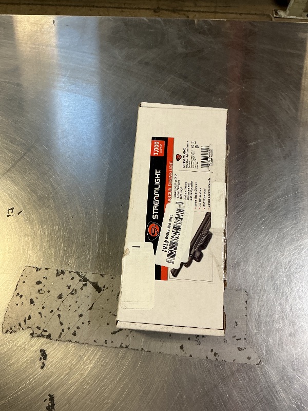 Photo 1 of Streamlight 69600 TL-Racker 1,000-Lumen 20,000-Candela Tactical Integratd Forend Weapon Light with Ambidextrous Controls for Mossberg 500/590 Models Only with Non-Rechargeable Batteries, Black