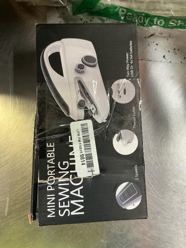 Photo 1 of Handheld Sewing Machine,Portable,Mini Sewing Machine,Easy to Use,Fast Sewing Speed,Suitable for Sewing Clothes,Fabric,DIY Home Machine for Beginners.Grey