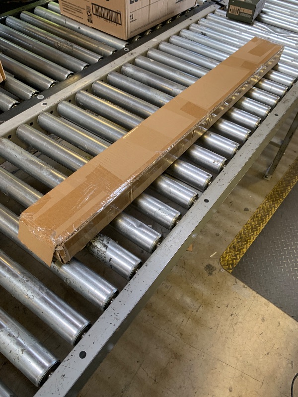 Photo 1 of brown window shade or blinds