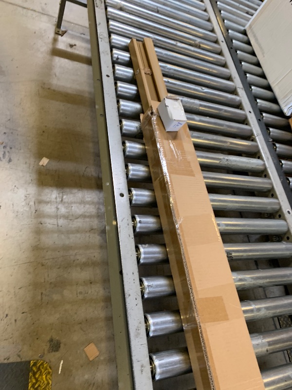 Photo 1 of brown window shade or blinds 