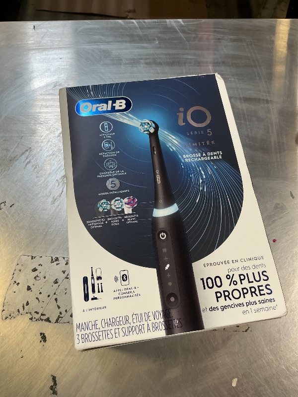 Photo 1 of Oral-B iO Deep Clean + Whiten Rechargeable Electric Toothbrush with Visible Pressure Sensor, 2 Minute Timer, 5 Cleaning Settings, 1 iO5 Limited, 3 Toothbrush Heads, Travel Case & Refill Holder, Black