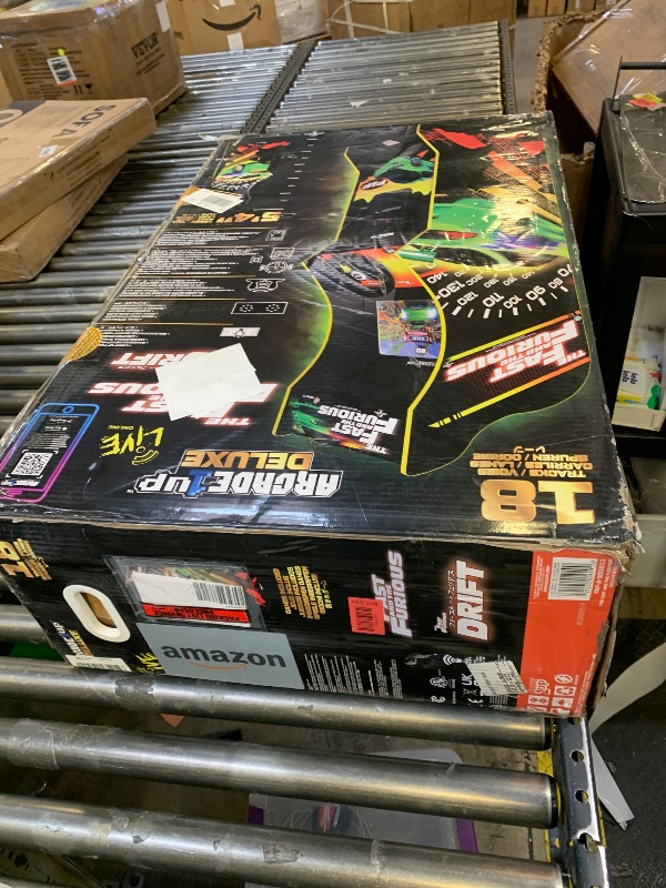 Photo 1 of ARCADE1UP The Fast & The Furious Deluxe Arcade Game for Your Home, with 5-Foot-Tall Stand-up Cabinet, 2 Classic Games, and 17-inch LCD Screen