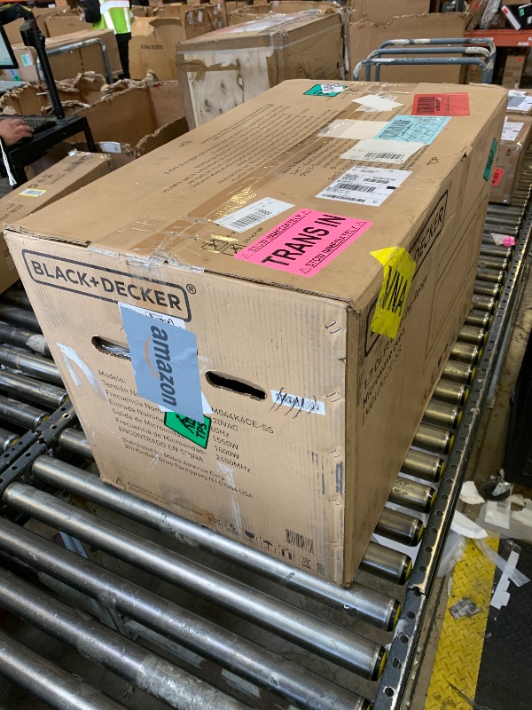 Photo 1 of BLACK+DECKER Over the Range Microwave Oven with Vent and One-Touch Auto Cooking, 1.7 cu. ft. OTR Over Stove Microwave, Stainless Steel, 1000 Watts, EM044K6CE-SS