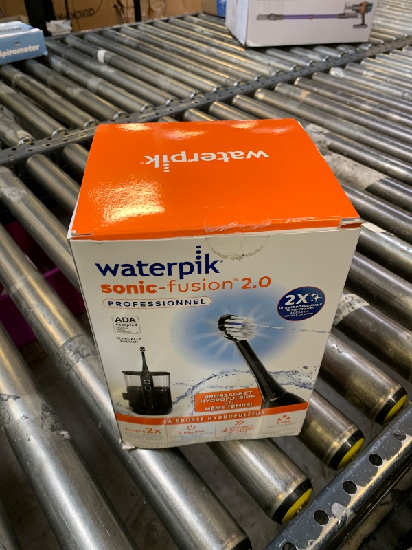 Photo 1 of Waterpik Sonic-Fusion 2.0 Professional Flossing Electric Toothbrush with Water Flosser Combo In One, Black SF-04, Packaging May Vary