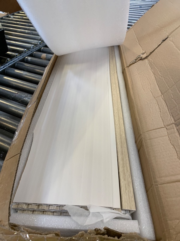 Photo 1 of LARWORKS WPC Slat Wall Panels 8 Pack 96" x 8.2", Waterproof Fluted Wall Paneling, Accent 3D Wall Panel for Wall Decor, Bathroom, Bedroom, Office - Widen Low Grille Oak (Cover Approx.44 sq.ft)