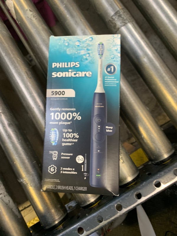 Photo 1 of Philips Sonicare 5900 Series Electric Toothbrush - Next-Generation Sonicare Technology, Pressure Sensor, 6 Brushing Settings, SmarTimer, BrushPacer, 21-Day Runtime, Navy Blue, Model HX7133/02