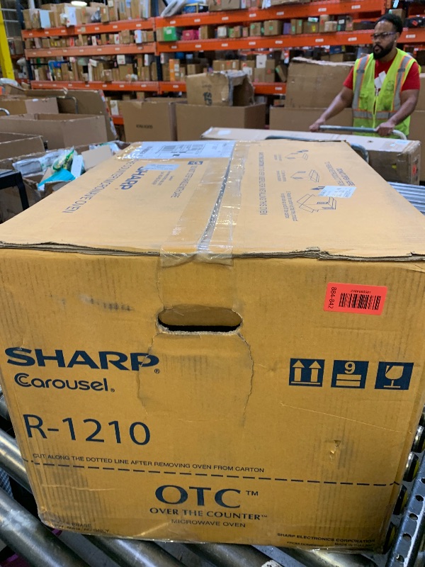 Photo 1 of Sharp R1210TY 1-1/2-Cubic-Foot 1100-Watt Over-the-Counter Microwave, Black