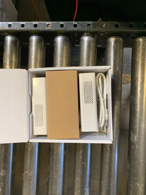 Photo 1 of NETGEAR Powerline Adapter Kit, 2000 Mbps Wall-Plug, 2 Gigabit Ethernet Ports with Passthrough + Extra Outlet (PLP2000-100PAS), uses Your existing Internet Service via Household Wiring