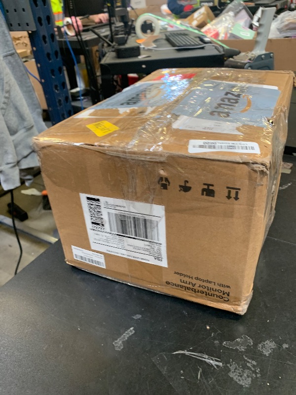 Photo 1 of monTEK Laptop Arm Mount for Desk for Max 32” Screen and 18” Notebook, Dual Monitor Stand with Adjustable Laptop Holder, Holds up to 19.8 lbs, Full Motion Arm with Clamp/Grommet Base, 75/100 VESA Mount