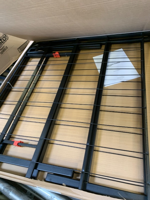 Photo 1 of Amazon Basics Foldable Metal Platform Bed Frame with Tool Free Setup, 18 Inches High, Sturdy Steel Frame, No Box Spring Needed, Twin, Black