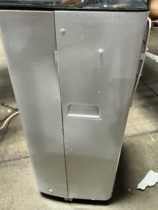 Photo 1 of ** unit is cracked on both sides, powers on*** BLACK+DECKER 8,000 BTU Portable Air Conditioner with Wifi & Remote Control, 3-1-in AC, Fan & Dehumidifier, with App, Alexa & Google Assistant, Window Kit