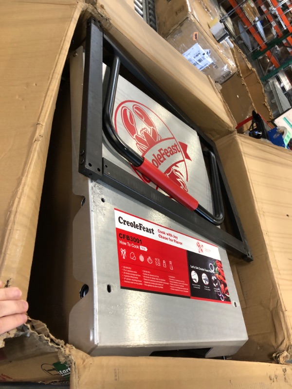 Photo 1 of *** POSSIBLE MISSING HARDWARE*** Creole Feast CFB3001 70 QT Outdoor Crawfish Boiler with Stir Paddle & Wheels, Heavy-Duty Seafood Boiler with Foldable Cylinder Bracket for Cajun Boils, Shrimp, Crab, and More, Silver & Black
