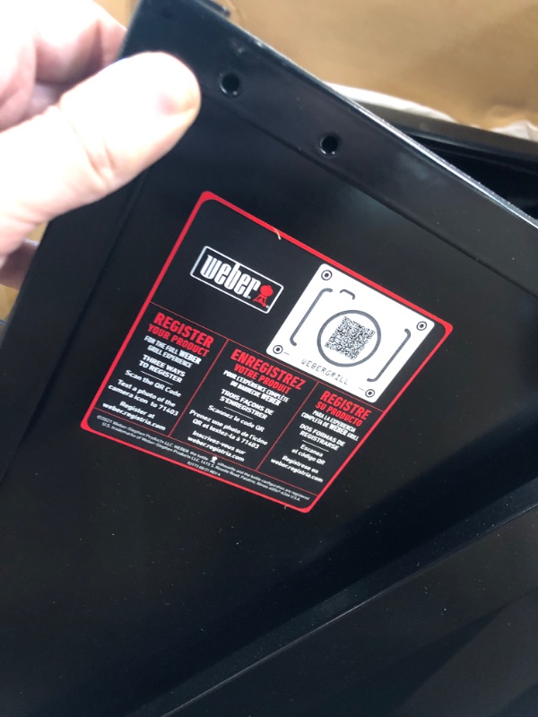 Photo 1 of *** DAMAGED TRAY MISSING SOME HARDWARE*** Weber Genesis E-335 Natural Gas Grill for Outdoor Cooking, 3 Burners and 1 Side Burner, Black – Porcelain-Enameled Cast-Iron Grates, PureBlu Burners & Sear Zone