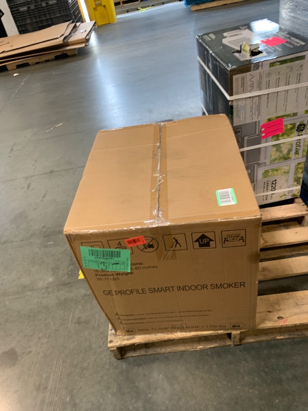 Photo 1 of ***FACTORY SEALED***
GE Profile™ Smart Indoor Pellet Smoker, with Active Smoke Filtration, 5 Smoke Control Settings, WiFi Connected, Electric, Countertop BBQ Appliance, Black