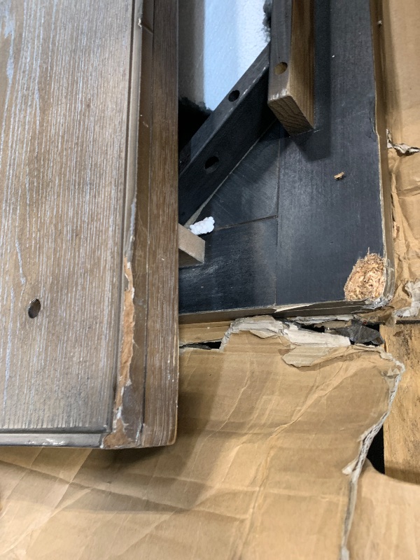 Photo 1 of **** COSMETIC DAMAGE *** Signature Design by Ashley Johnelle Farmhouse Coffee Table with Weathered Gray Finish, Gray