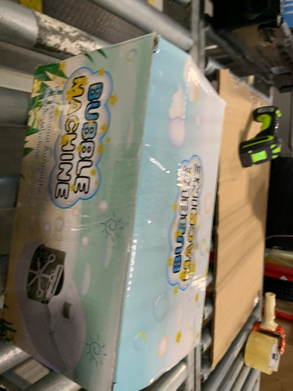 Photo 1 of **UNTESTED**
Bubble Machine, Automatic 18000+ Per Minute Big Bubbles Blower Maker for Kids Toddlers with 2 Speeds,6 Wands,Operated by Plugin or Batteries for Outdoor/Indoor Birthday Parties,Wedding (White)