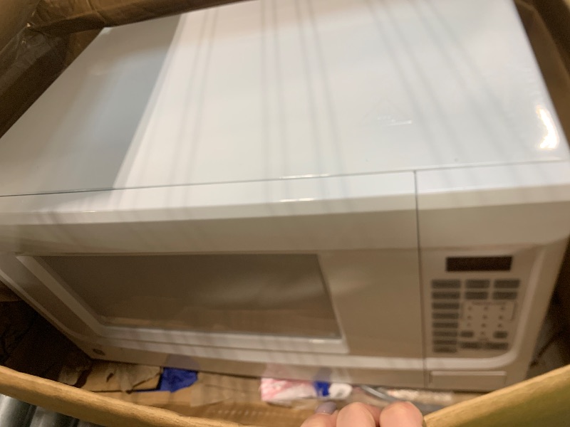 Photo 1 of ** sold as is no refund/return** GE® 1.4 Cu. Ft. Countertop Microwave Oven