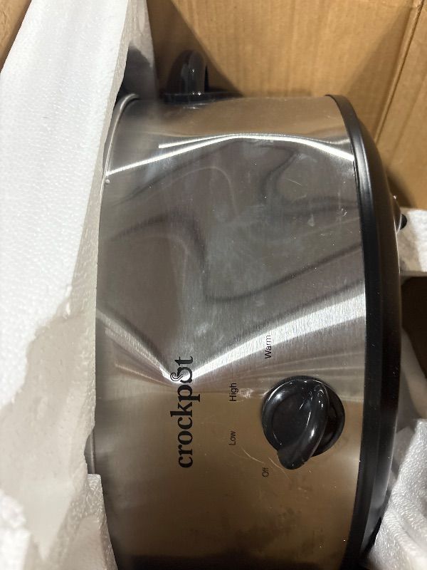 Photo 1 of **DENTED**
Crock-Pot 7-Quart Manual Slow Cooker, Family Size Serves 8+ People & Fits 6-lb Roast, Removable Stoneware with Warming Setting, Dishwasher Safe for Easy Cleanup, Stainless Steel