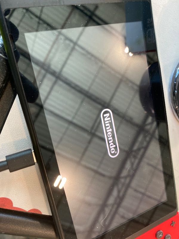 Photo 1 of **USED**
Nintendo Switch SYSTEM