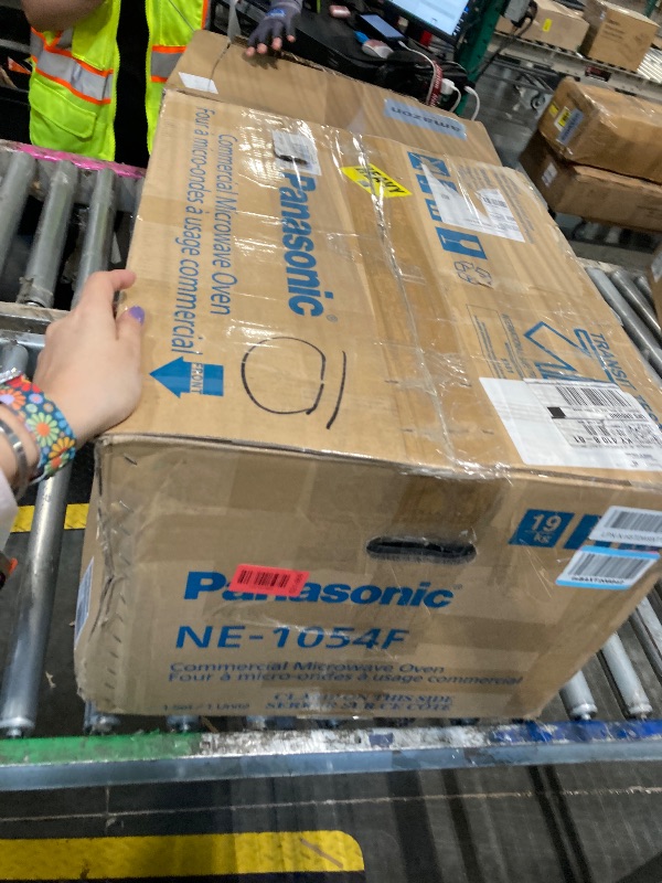 Photo 1 of ** sold as is no refund/return** Panasonic NE-1054F Compact Light-Duty Countertop Commercial Microwave Oven with 10 Programmable Memory and Touch Screen Control, Countertop Microwave Oven, 1000W, 0.8 Cu. Ft, Stainless Steel