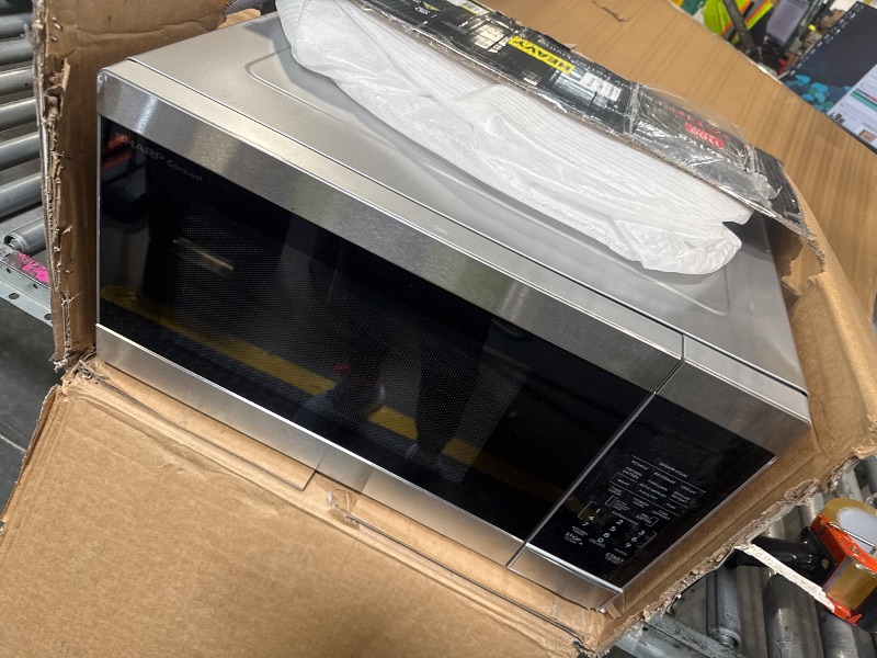 Photo 1 of ***damage minor*** SHARP Countertop Microwave Oven with Removable 13.6" Carousel Turntable, 1100 Watt, 1.6 Cubic Feet, Stainless Steel
