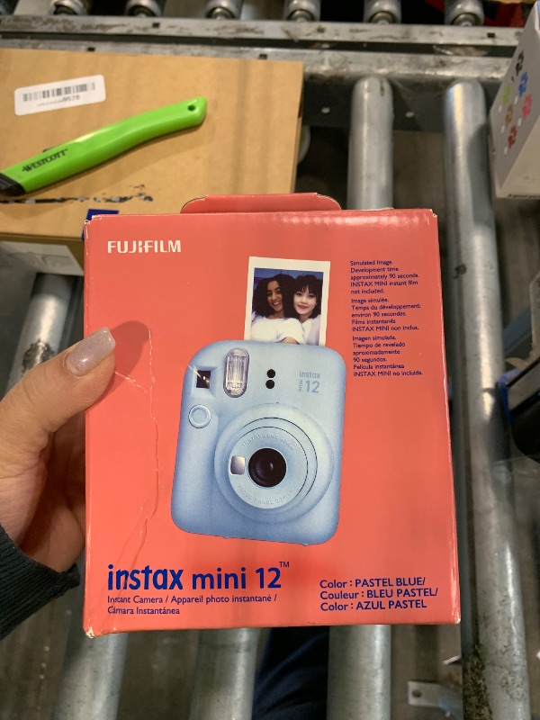 Photo 1 of [HEAVY DAMAGE NONFUNCTIONAL] Fujifilm Instax Mini 12 Instant Film Camera - Pastel Blue