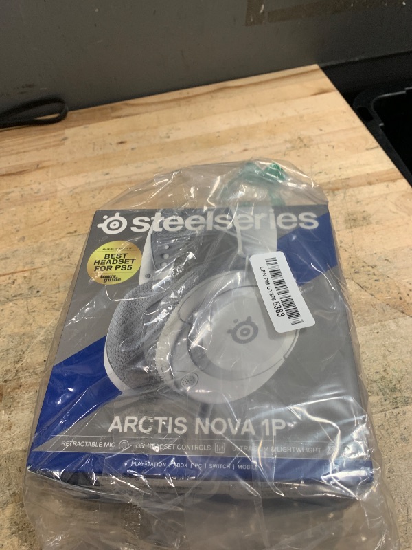 Photo 1 of **MISSING HARDWARE** SteelSeries Arctis Nova 1P Multi-System Gaming Headset — Hi-Fi Drivers — 360° Spatial Audio — Comfort Design — Durable — Lightweight — Noise-Cancelling Mic — PS5/PS4, PC, Xbox, Switch - White