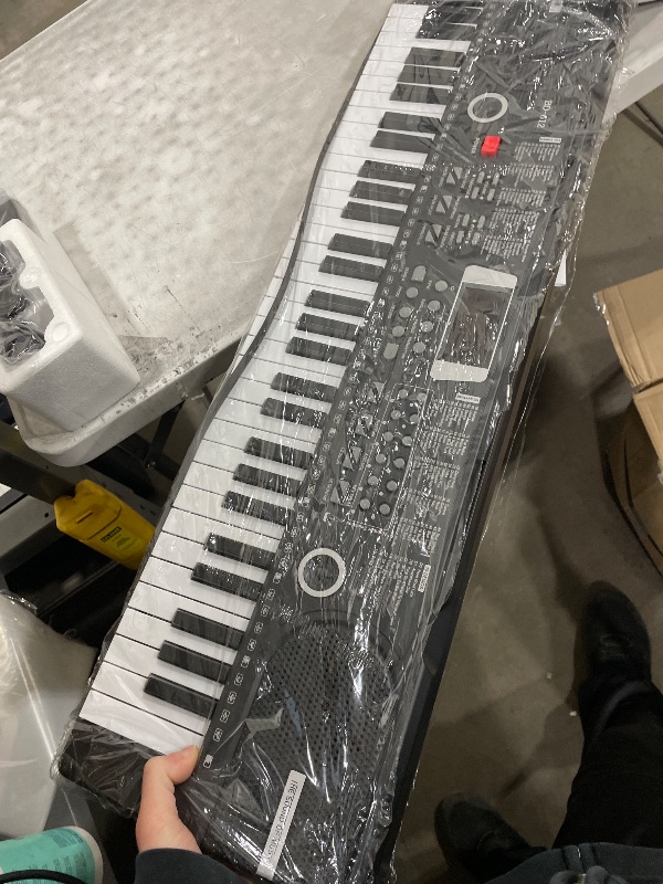 Photo 1 of **********MISSING POWER CORD AND MIC**************
61 Key Keyboard Piano, Portable Electronic Keyboard Piano for Beginners with Speakers, Microphone, Sheet Music Stand, 100 Voices, 100 Rhythms, Digital Music Keyboard for Teen