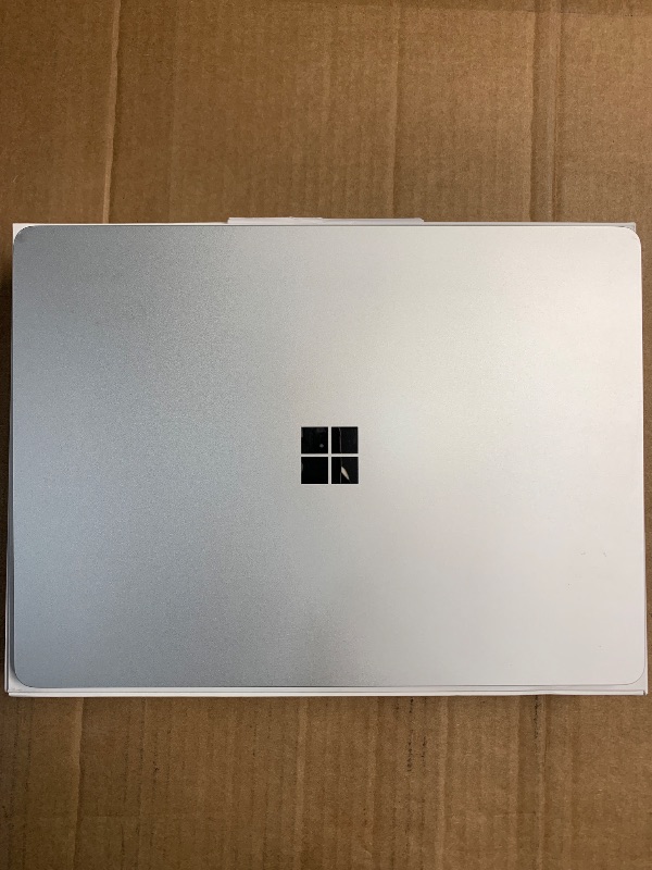 Photo 1 of **Damaged Screen**
Microsoft Surface Laptop (2024), Windows 11 Copilot+ PC, 13.8" Touchscreen Display, Snapdragon X Elite (12 core), 16GB RAM, 512GB SSD Storage, Platinum