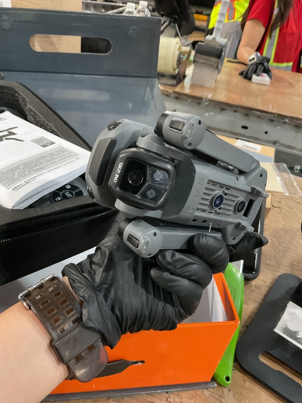 Photo 1 of **PARTS ONLY** GPS Drone with 8K Camera for Adults, Obstacle Avoidance, 5G Large Screen Controller, Follow Me, 3 Batteries 75 Min Flight Time, 50x Zoom, Brushless Motor, Under 249g (Deep Space Grey) ** the bottom side of a leg is broken see pics **