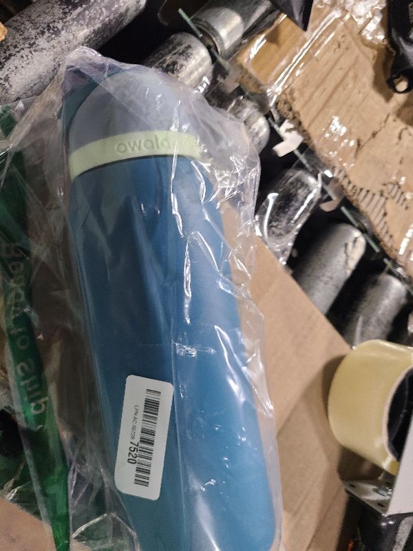 Photo 1 of Owala FreeSip Insulated Stainless Steel Water Bottle with Straw, BPA-Free Sports Water Bottle, Great for Travel, 40 Oz, Denim