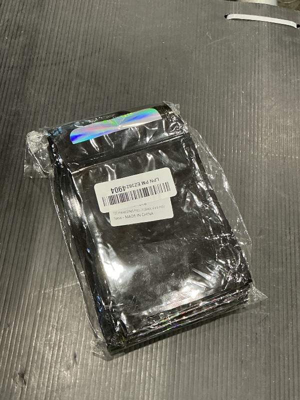 Photo 1 of 100 Pieces Smell Proof Mylar Bags, Holographic Packaging Bags, Resealable Odor Foil Pouch Zipper Bag with Clear Window for Food Storage and Lipgloss, Jewelry Lash (Black, 4 x 6 Inch)