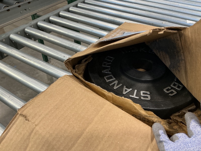 Photo 1 of *See clerk notes*
Fitvids Olympic Cast Iron 2-Inch Weight Plates for Strength Training & Weightlifting, 50 Pounds Set