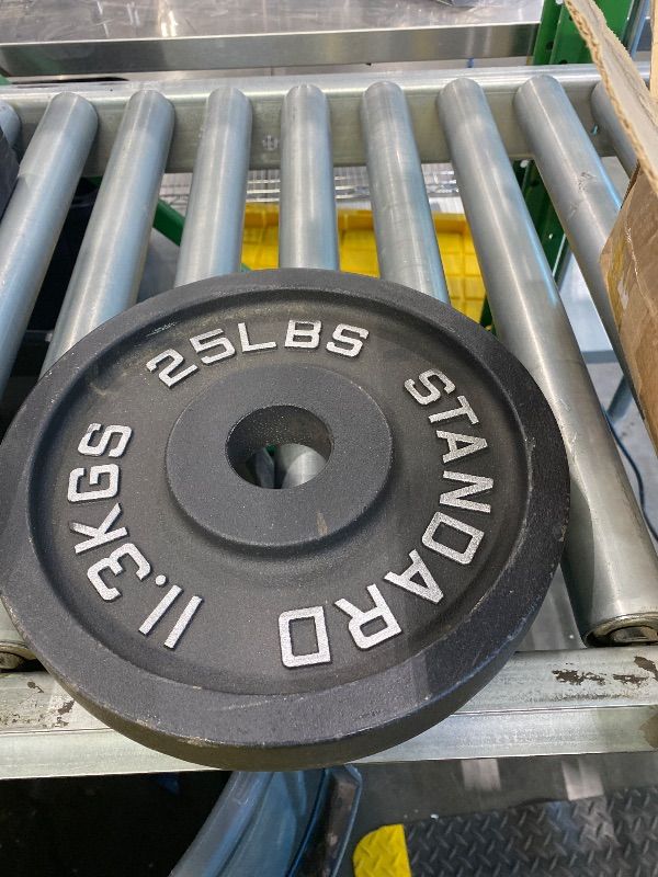 Photo 1 of *See clerk notes*
Fitvids Olympic Cast Iron 2-Inch Weight Plates for Strength Training & Weightlifting, 50 Pounds Set