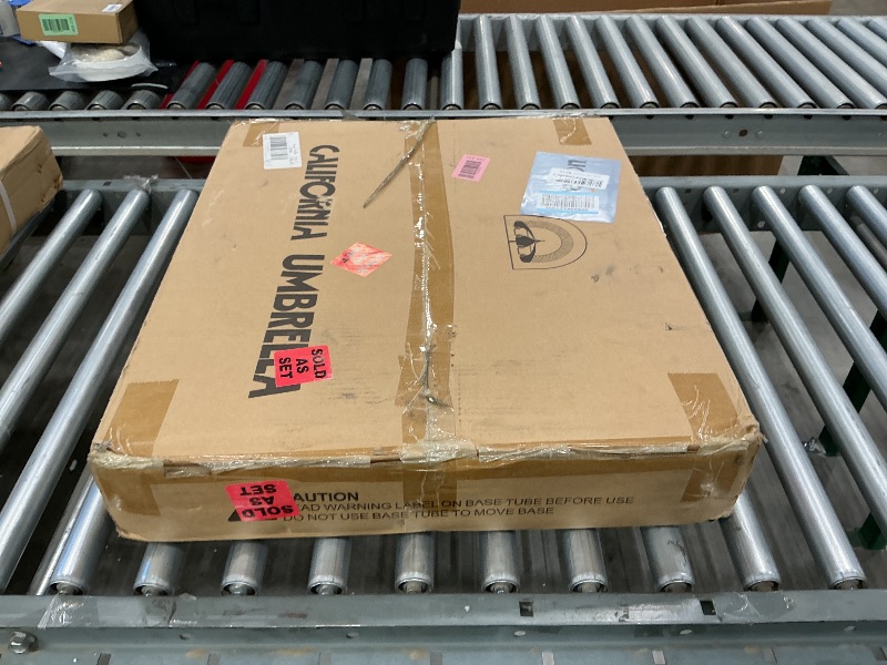 Photo 1 of *Partial Set*
California Umbrella 50 lbs. Round Concrete Weighted Powdercoated Steel Umbrella Base, White Frame