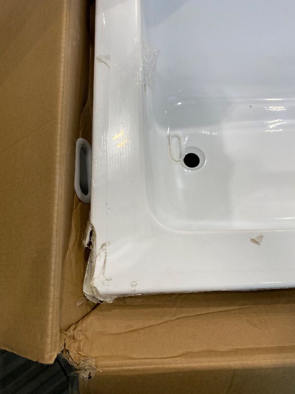 Photo 1 of *Minor Damaged - Check clerk notes*
Swiss Madison Bathtub