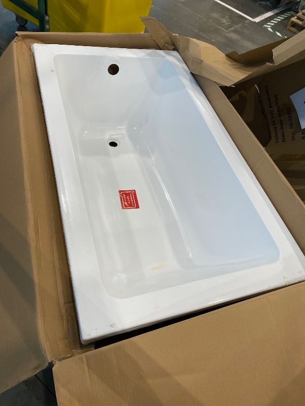 Photo 1 of *Minor Damaged - Check clerk notes*
Swiss Madison Bathtub