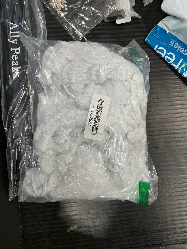 Photo 1 of 1000 sqft Spider Webs Halloween Decorations Bonus with 30 Fake Spiders, Super Stretch Cobwebs for Halloween Indoor and Outdoor Party Supplies