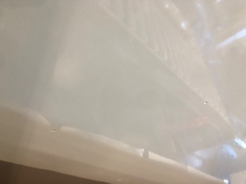 Photo 1 of **minor damage**95 in white board by 50 in 