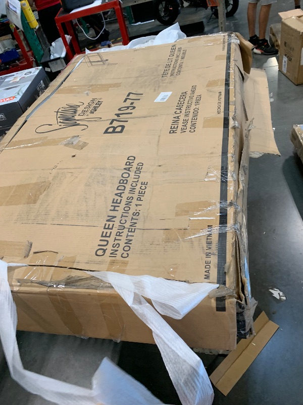 Photo 1 of ***HEADBOARD AND 2 LEGS ONLY IN BOX, BED FRAME NOT INCLUDED*** Signature Design by Ashley Flynnter Traditional Sleigh Headboard with Metal Accents ONLY, Queen, Light Brown