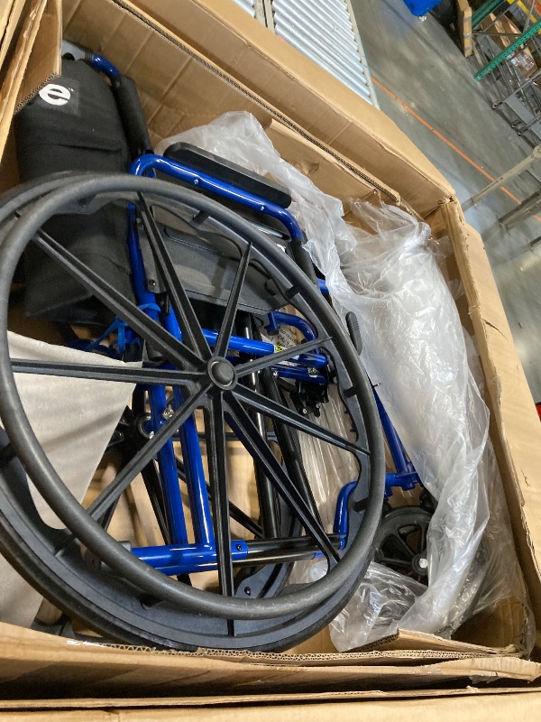 Photo 1 of ***DOES NOT INCLUDE FEET REST*** Drive Medical Blue Streak Lightweight Wheelchair with Swing-Away Footrests and Flip-Back Arms, Portable Folding Wheelchair for Adults and Seniors, 18 Inch Seat