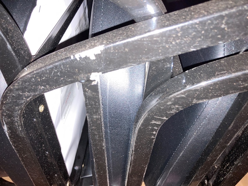 Photo 1 of ****MINOR SCRATCHES**** Flash Furniture 4 Pack Hercules Series Trapezoidal Back Stacking Banquet Chair, Set of 4, Black Vinyl/Black Frame