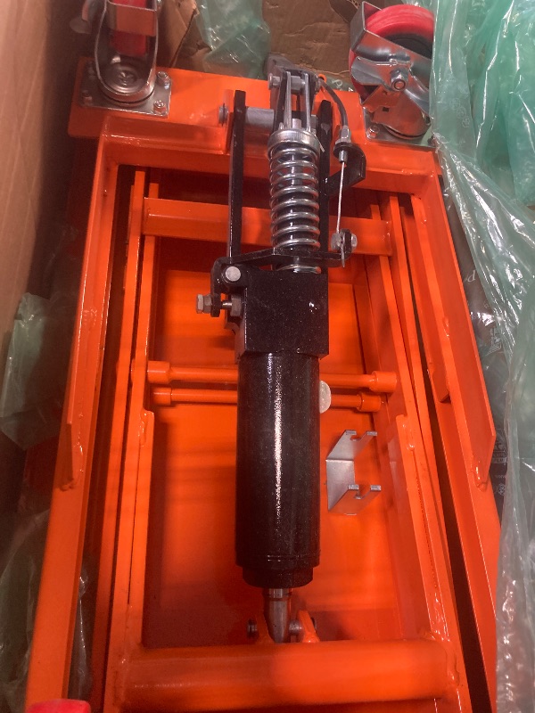 Photo 1 of ****MINOR USAGE*** VEVOR Hydraulic Lift Table Cart, 330lbs Load Capacity 50 Inch Lifting Height, Manual Single Scissor Lift Table with Non-Slip Pad and 4 Wheels, Hydraulic Scissor Cart for Material Handling, Orange