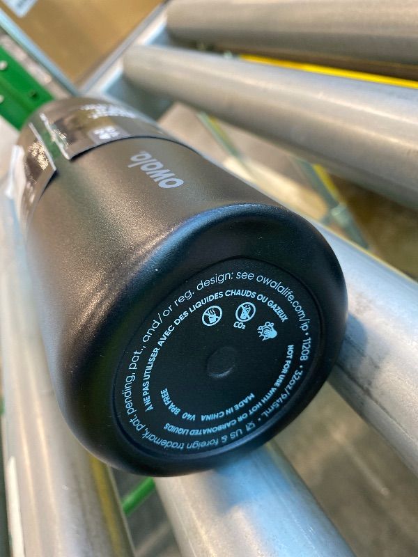 Photo 1 of *Minor Damaged* Owala FreeSip Insulated Stainless Steel Water Bottle with Straw, BPA-Free Sports Water Bottle, Great for Travel, 32 Oz, Very, Very Dark